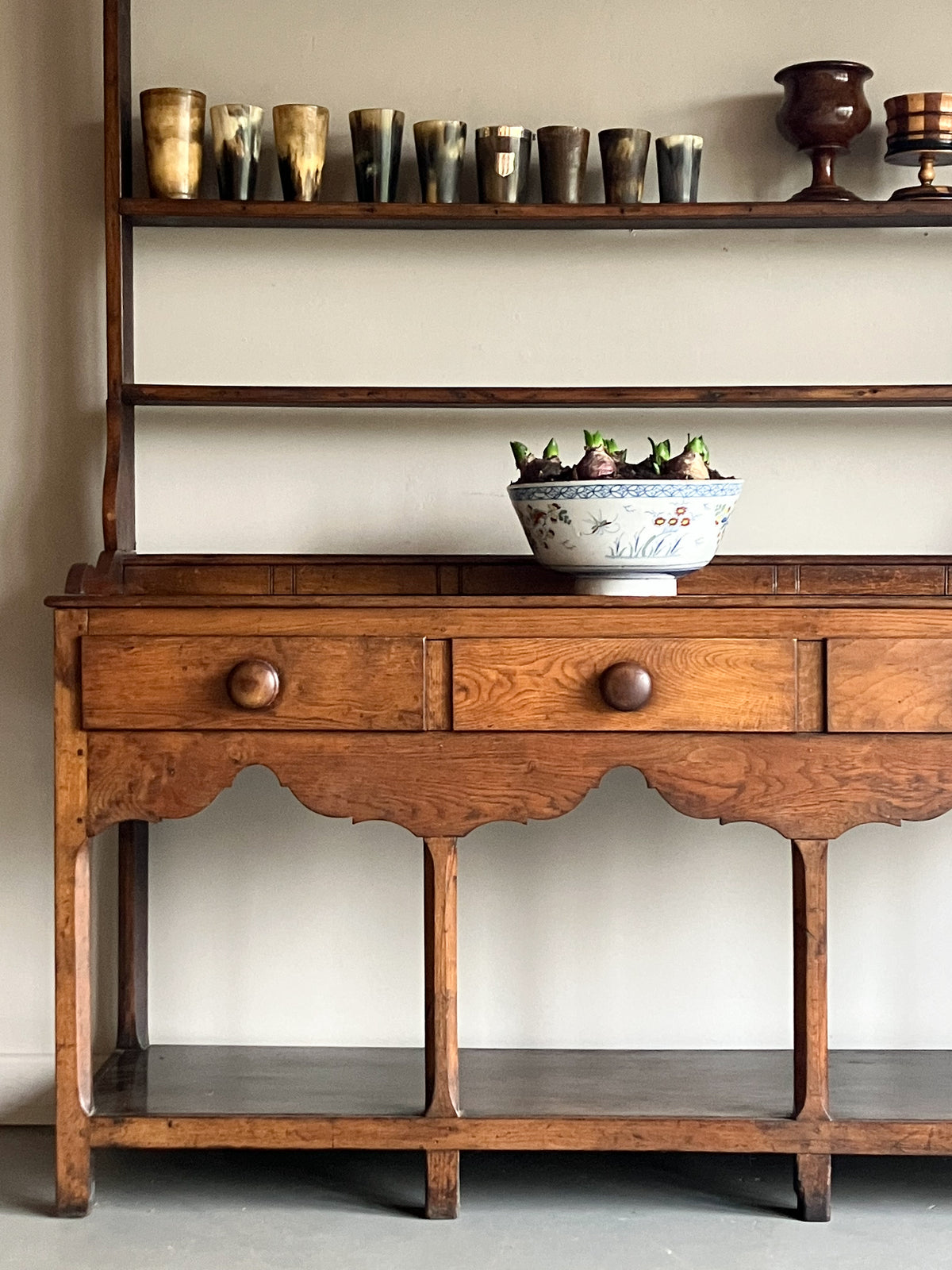 An Early 19th Fruitwood Pot Board Dresser