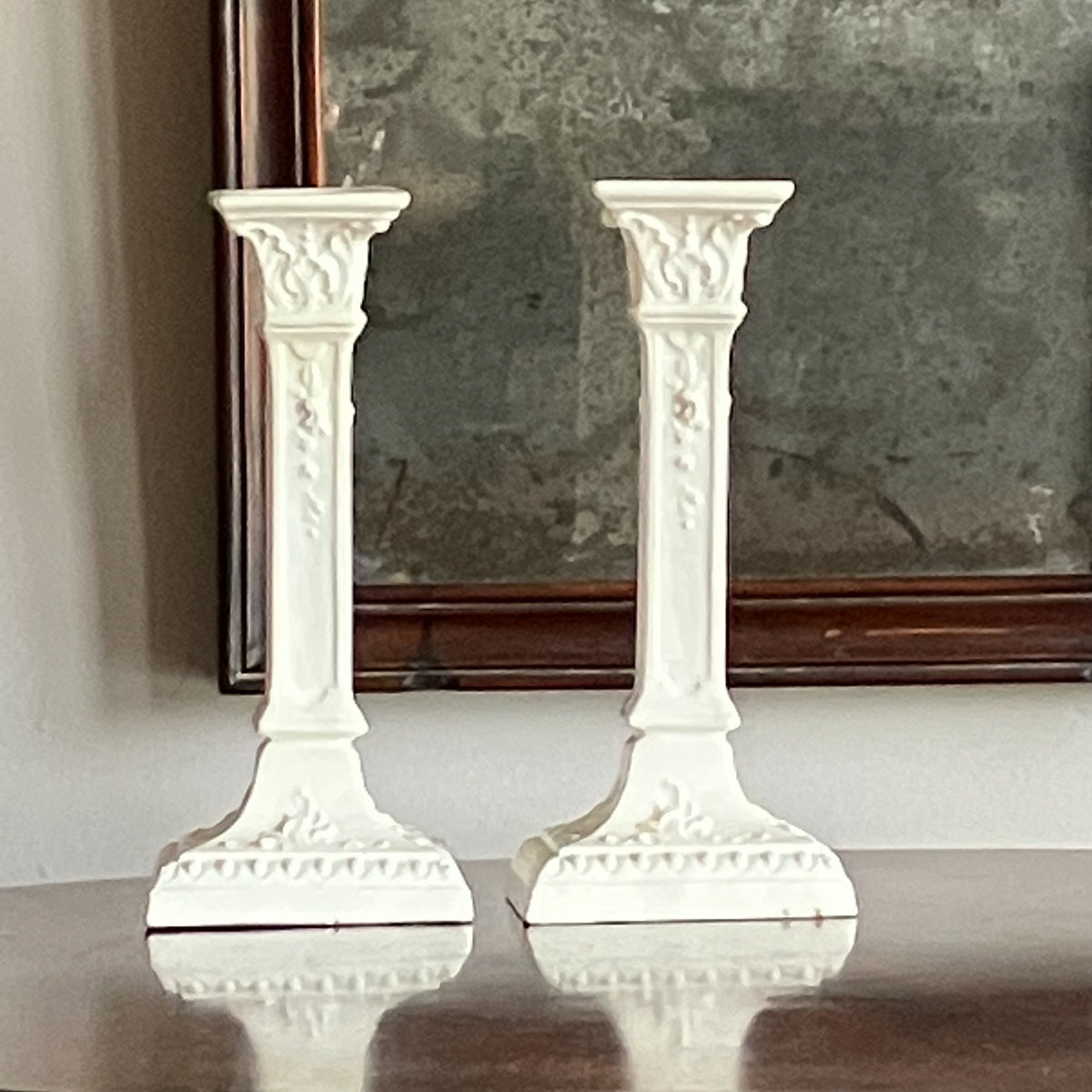 A Pair of Early 19th Century Creamware Columnar Candlesticks